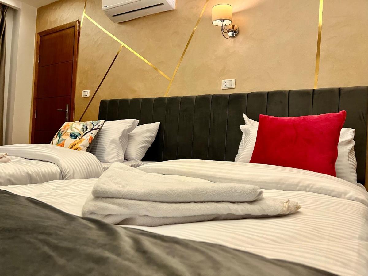 Kafret el-Gabal Grand Pyramids Inn מראה חיצוני תמונה
