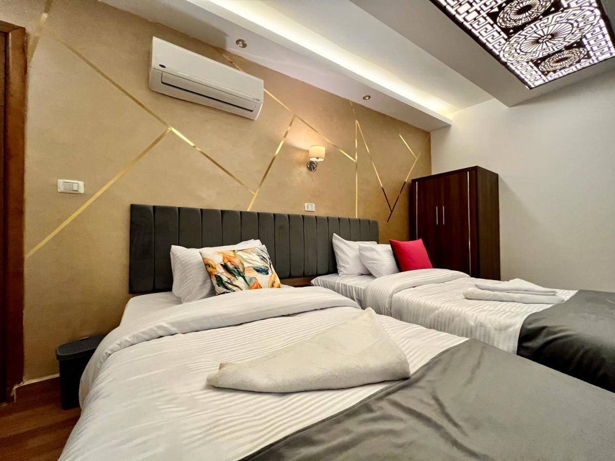 Kafret el-Gabal Grand Pyramids Inn מראה חיצוני תמונה