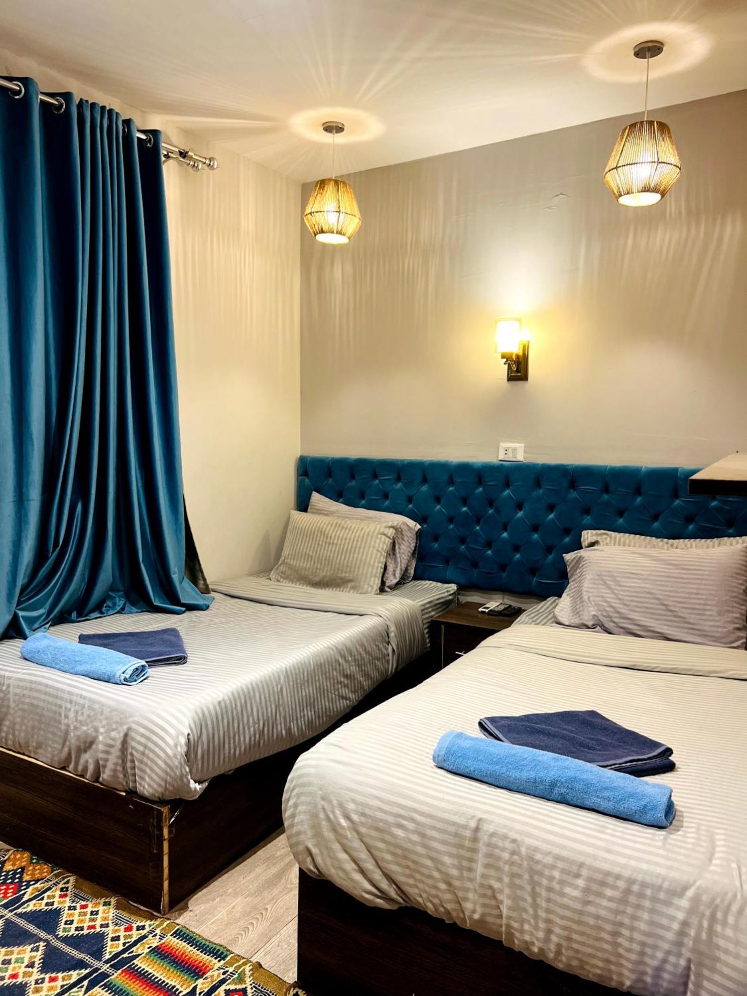 Kafret el-Gabal Grand Pyramids Inn מראה חיצוני תמונה