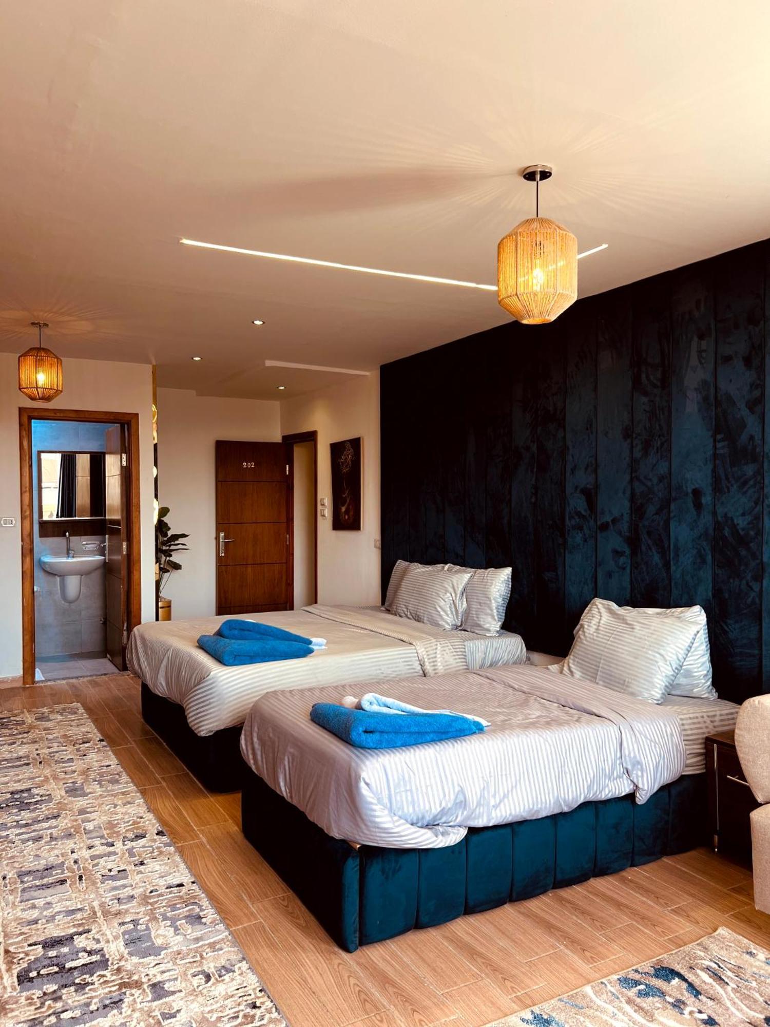 Kafret el-Gabal Grand Pyramids Inn מראה חיצוני תמונה